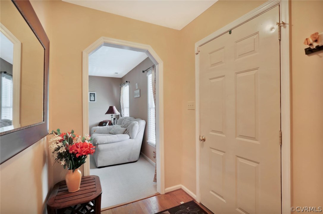 2606 Iverson Road Midlothian, VA 23112 - Photo 3 of 19 a living room with furniture and flowers