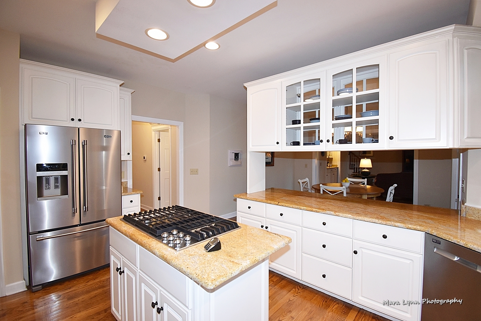 4N555 Hidden Oaks Road St. Charles, IL 60175 - Photo 12 of 41 a kitchen with granite countertop a stove and a refrigerator