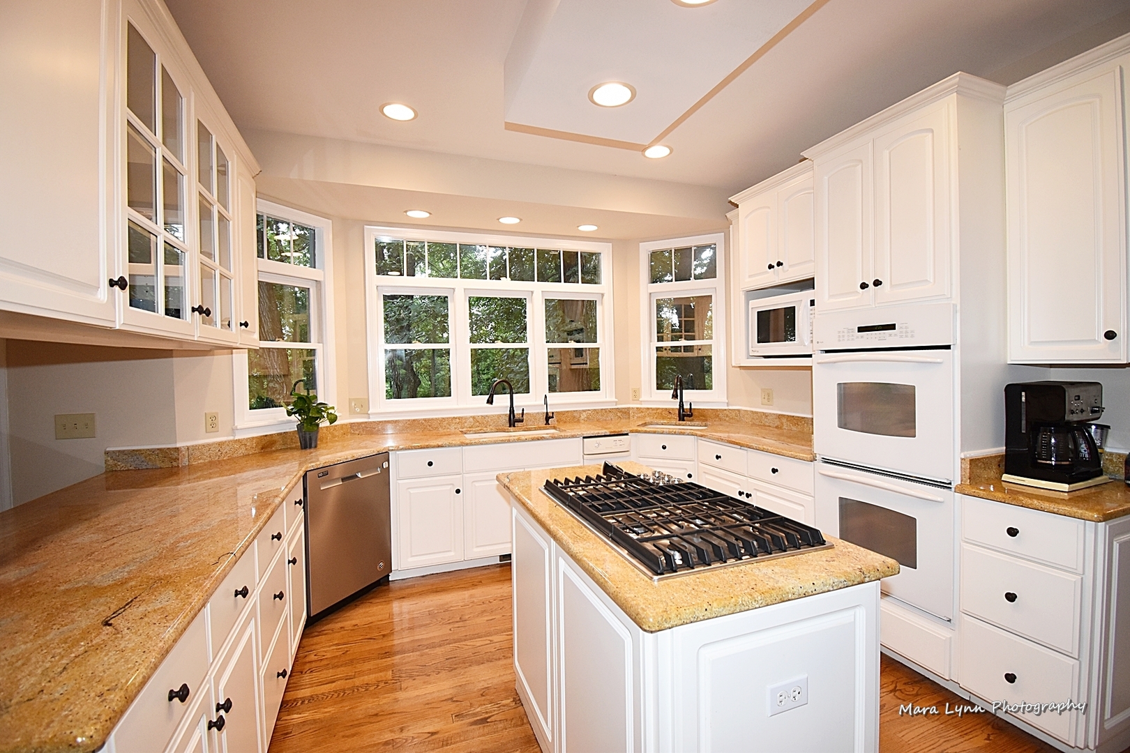 4N555 Hidden Oaks Road St. Charles, IL 60175 - Photo 13 of 41 a large kitchen with stainless steel appliances granite countertop a stove and a sink
