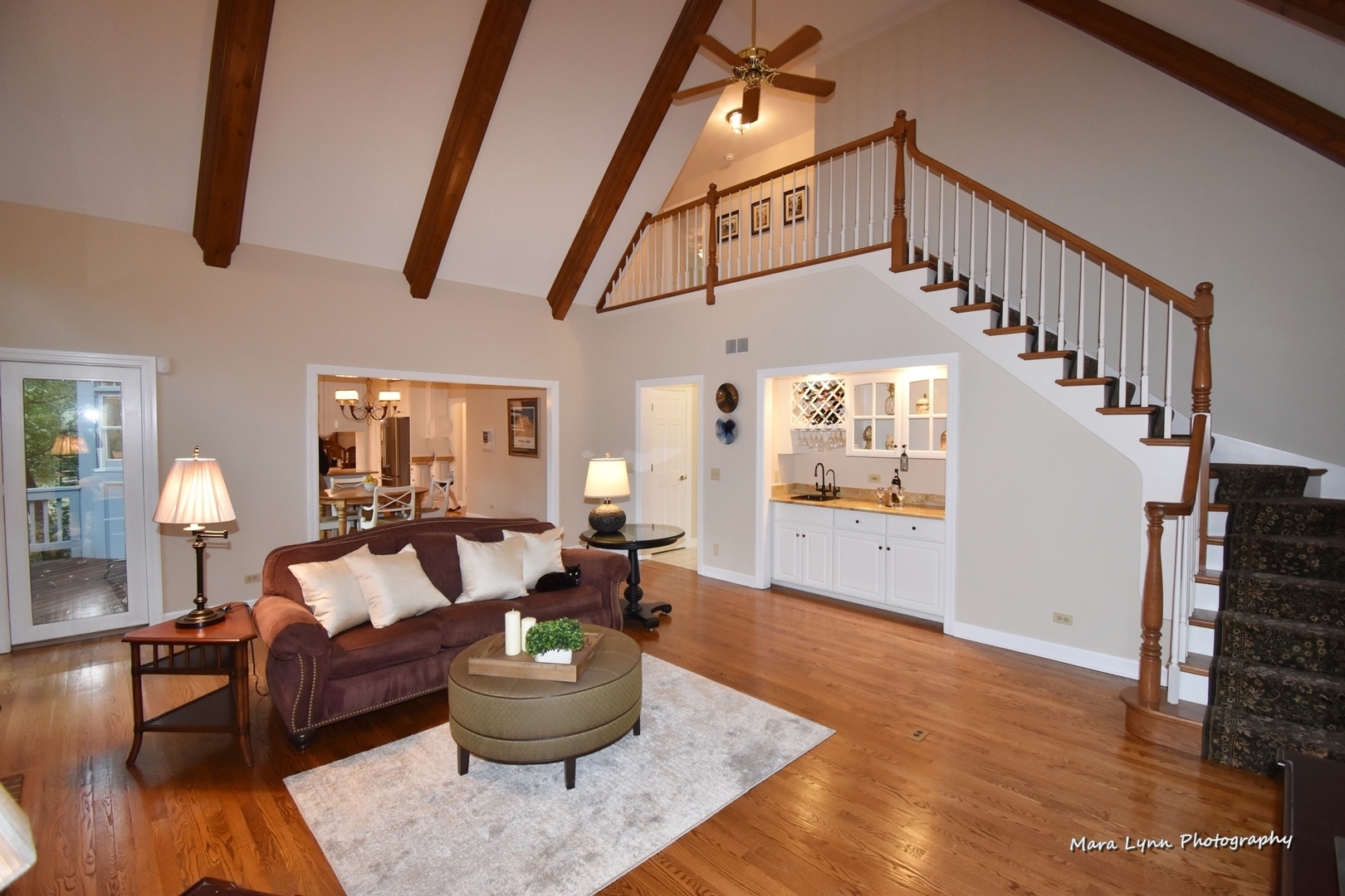 4N555 Hidden Oaks Road St. Charles, IL 60175 - Photo 16 of 41 a living room with furniture and a chandelier