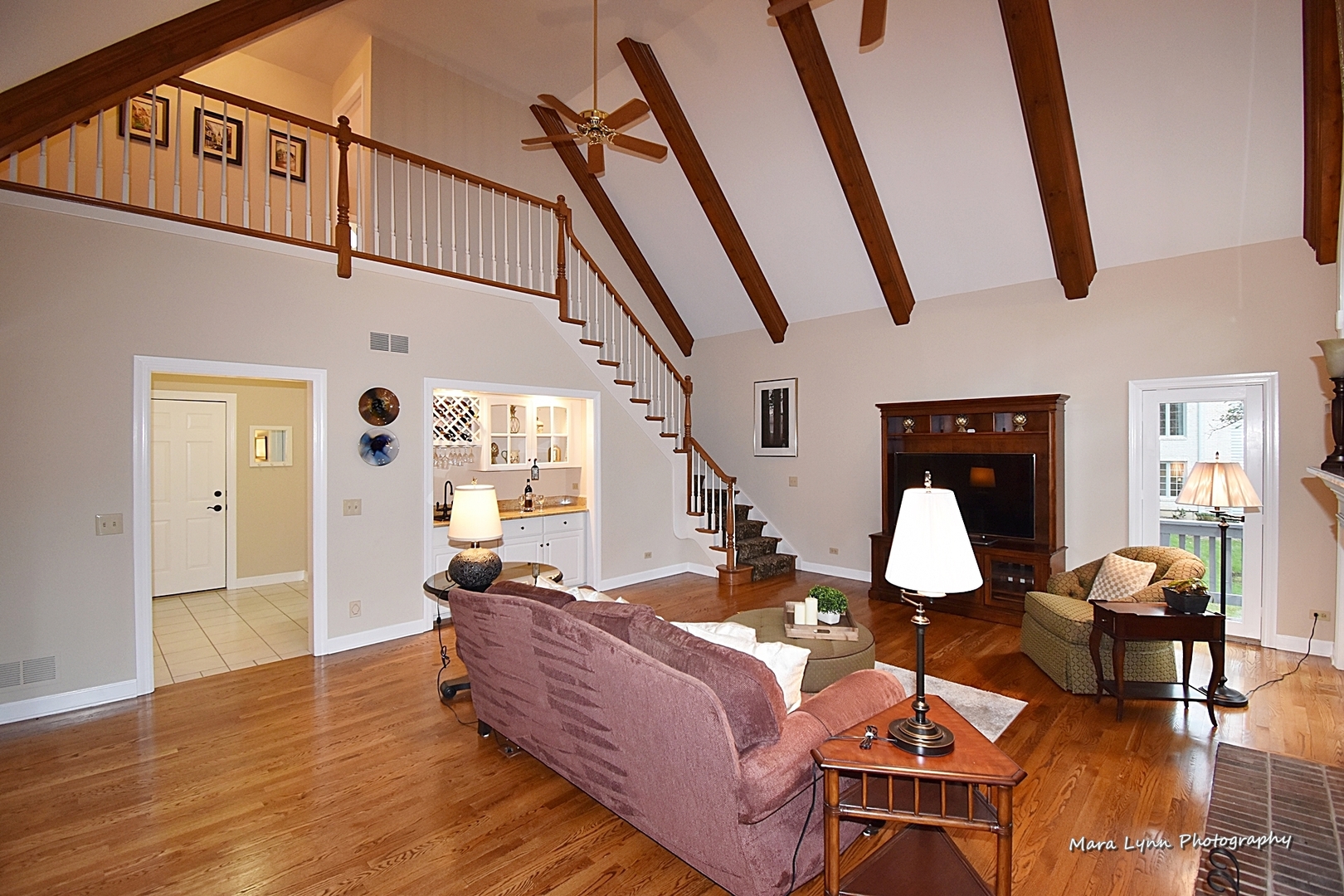 4N555 Hidden Oaks Road St. Charles, IL 60175 - Photo 17 of 41 a living room with couches chairs and wooden floor