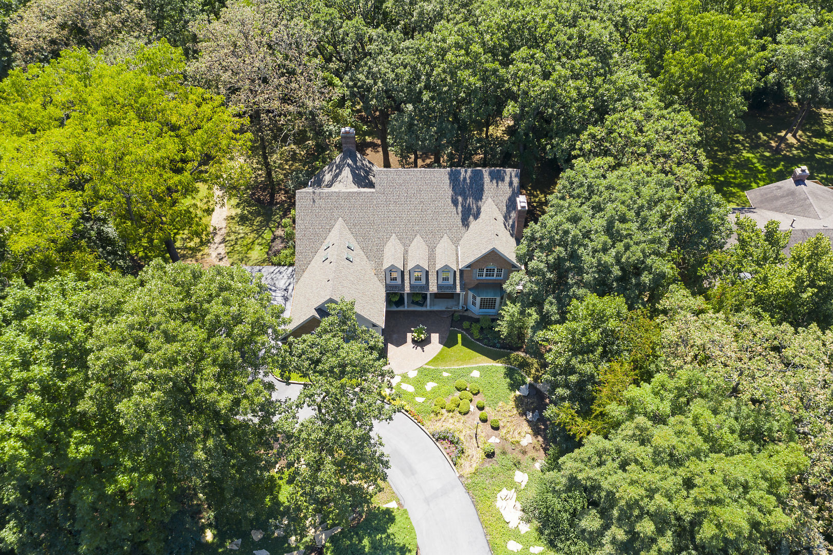 4N555 Hidden Oaks Road St. Charles, IL 60175 - Photo 3 of 41 an aerial view of a house with a yard basket ball court and outdoor seating