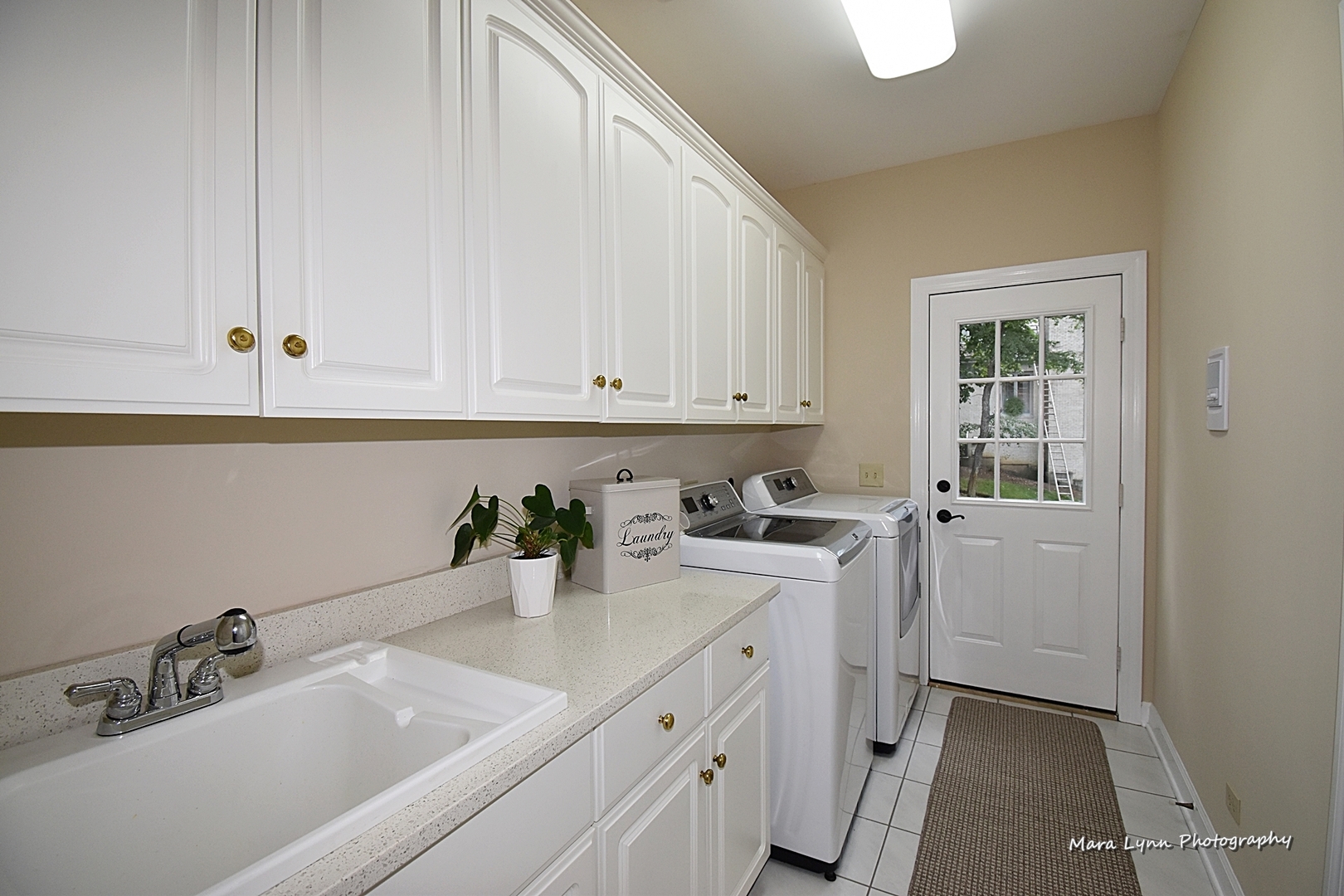 4N555 Hidden Oaks Road St. Charles, IL 60175 - Photo 22 of 41 a kitchen with a sink cabinets and window