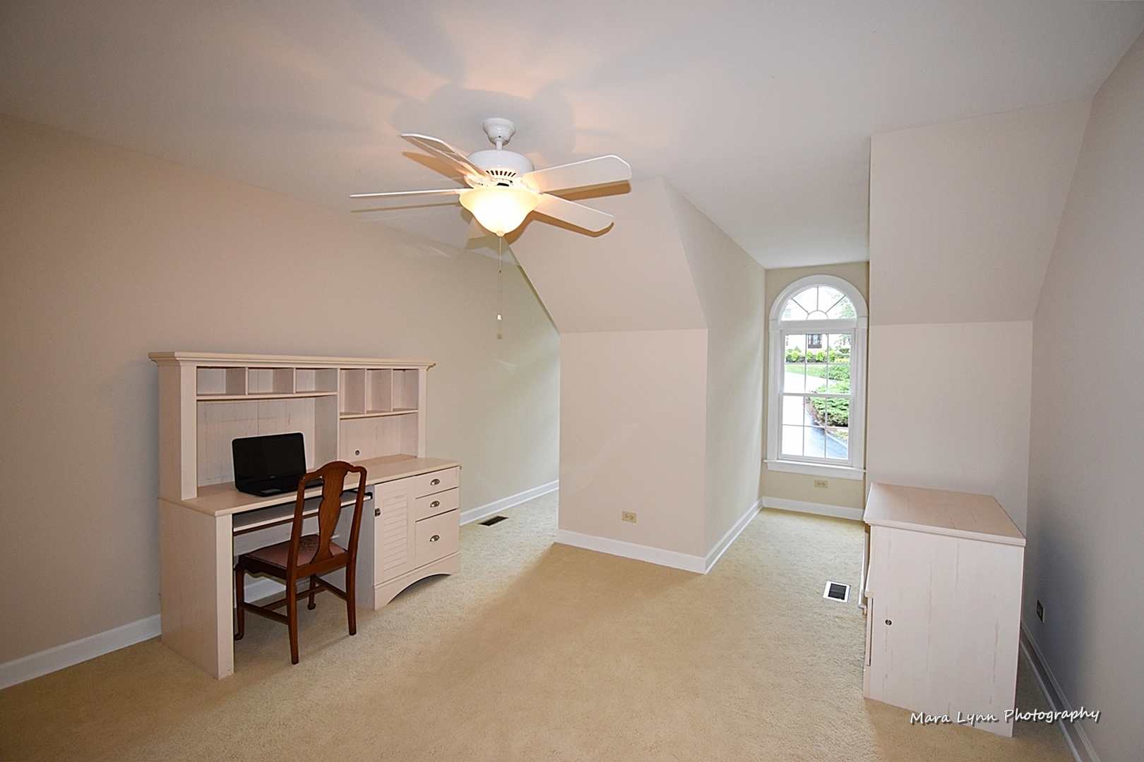 4N555 Hidden Oaks Road St. Charles, IL 60175 - Photo 30 of 41 a view of a workspace with furniture and chandelier fan