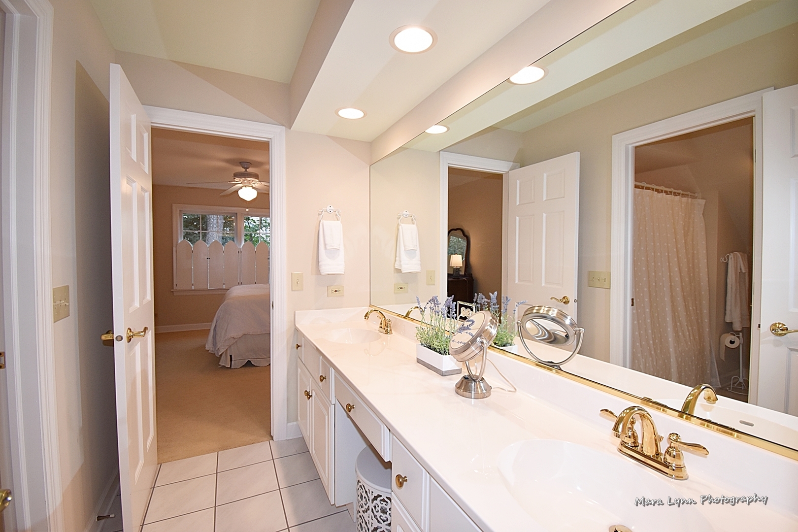 4N555 Hidden Oaks Road St. Charles, IL 60175 - Photo 32 of 41 a en suite bathroom with a double vanity sink and mirror