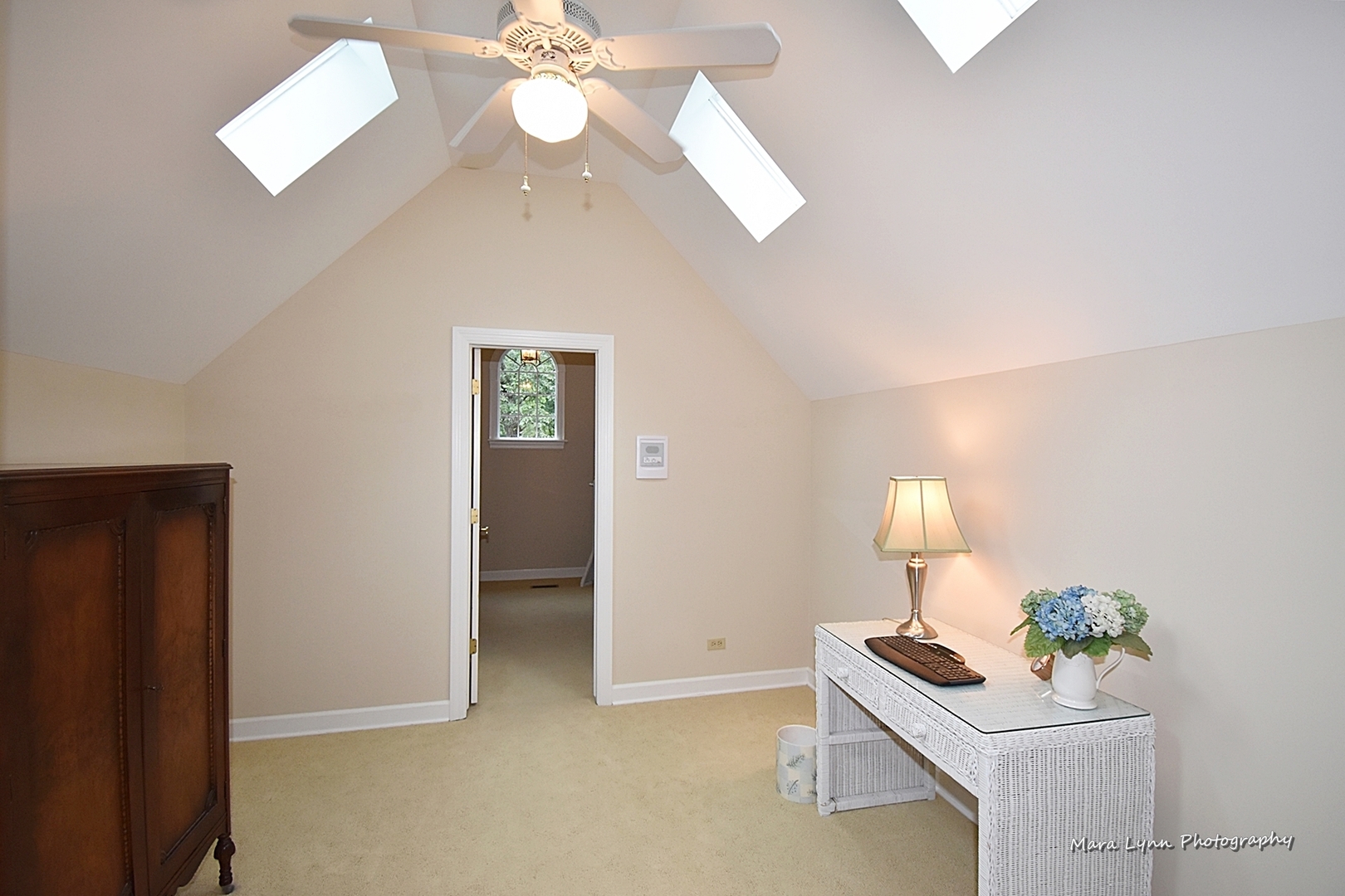 4N555 Hidden Oaks Road St. Charles, IL 60175 - Photo 34 of 41 a room with chandelier fan and windows