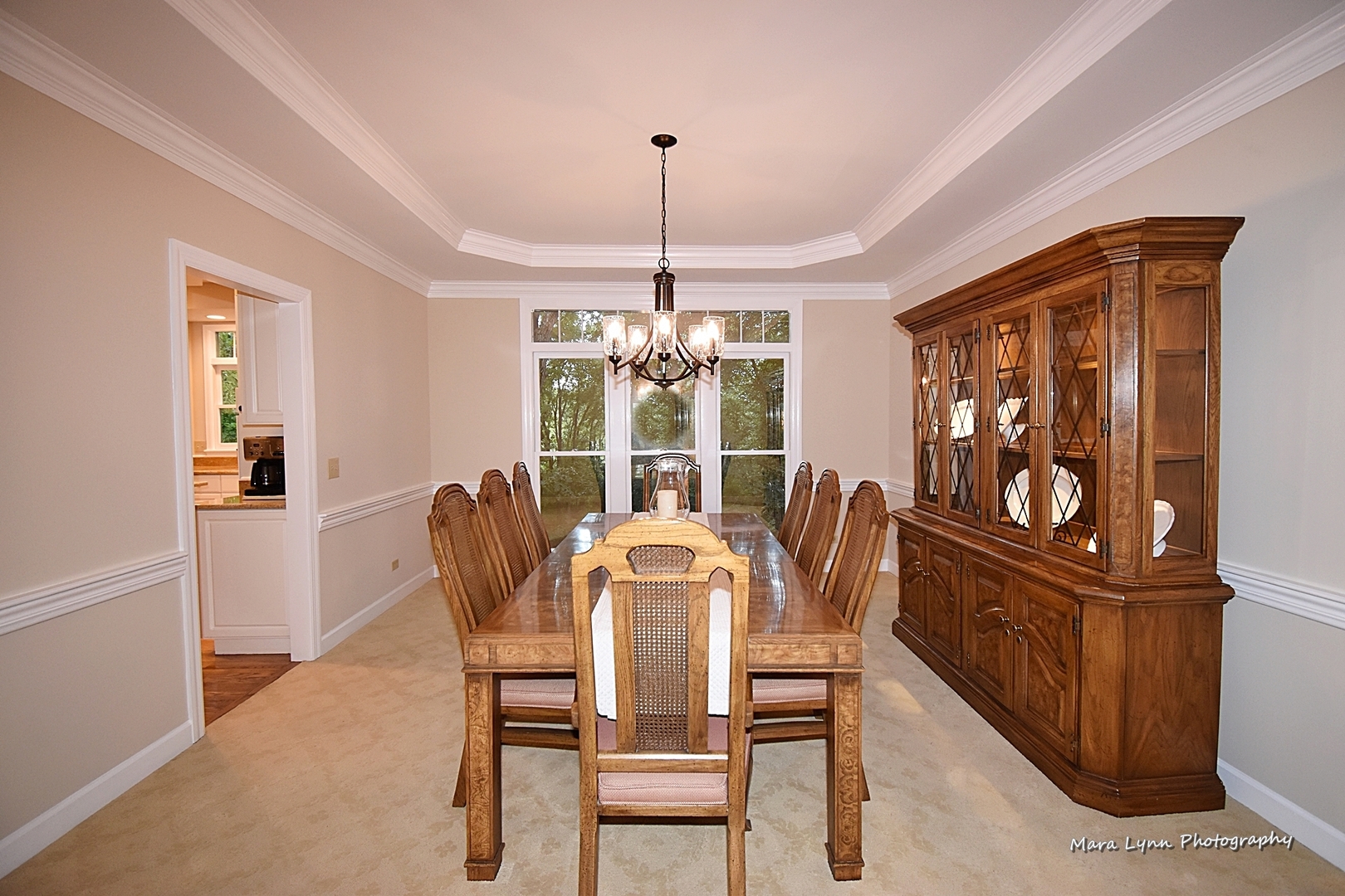 4N555 Hidden Oaks Road St. Charles, IL 60175 - Photo 10 of 41 a dining room with furniture a chandelier and window