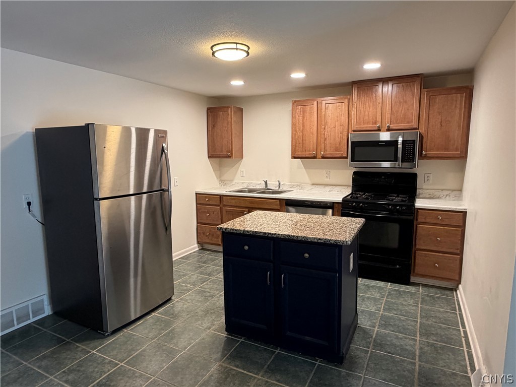 8587 Caughdenoy Road Clay, NY 13041 - Photo 5 of 21 Updated kitchen
