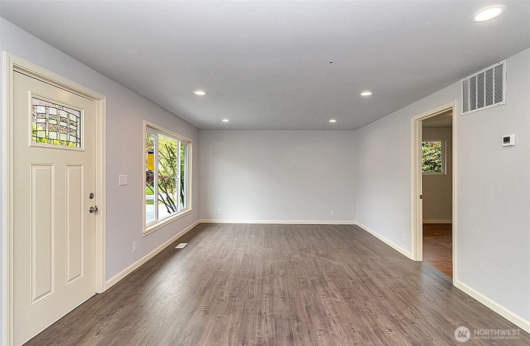 2325 Cherry Road, Unit B Lake Stevens, WA 98258 - Photo 3 of 13 wooden floor in an empty room with a window