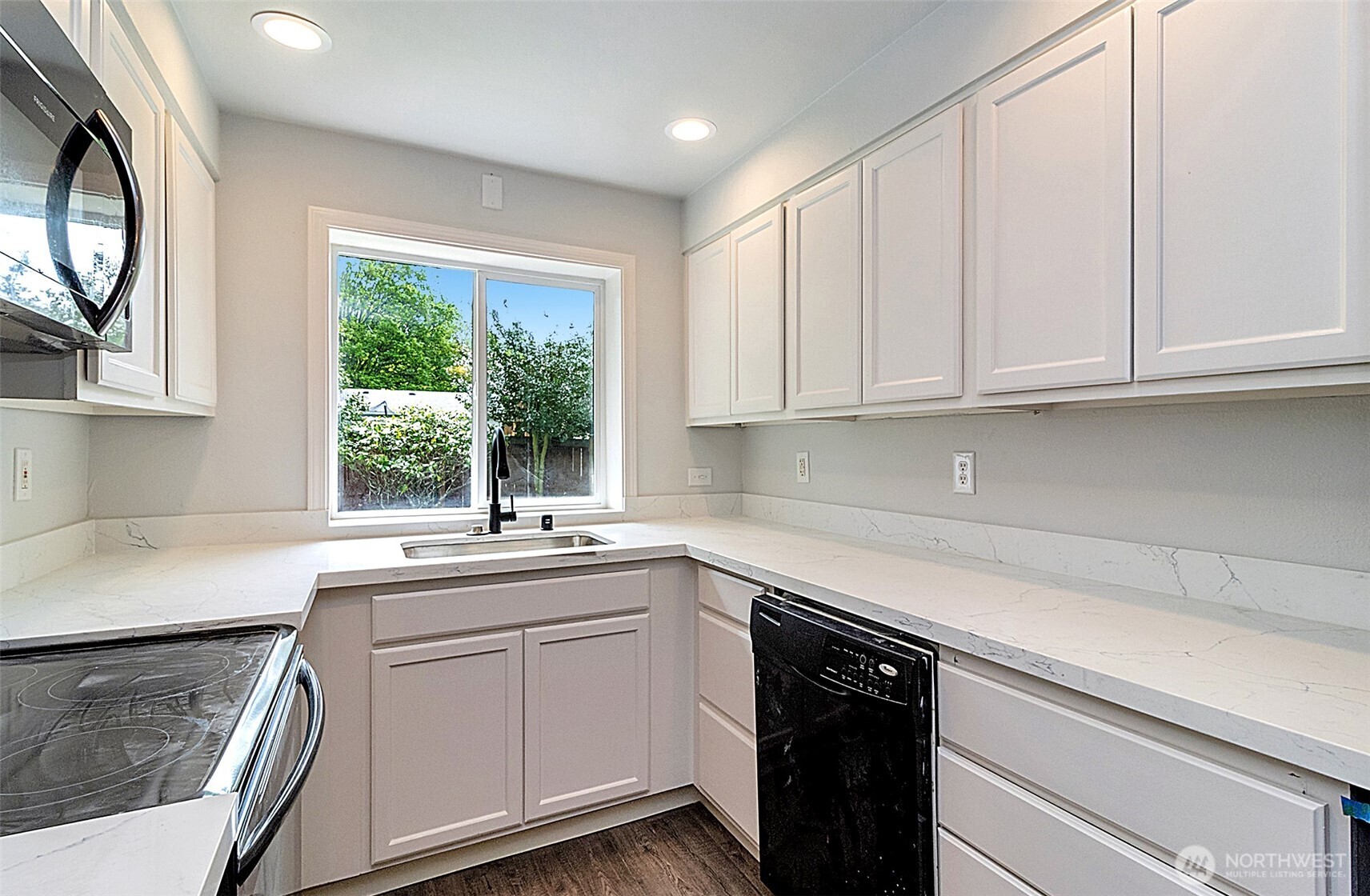 2325 Cherry Road, Unit B Lake Stevens, WA 98258 - Photo 9 of 13 a kitchen with white cabinets and a window