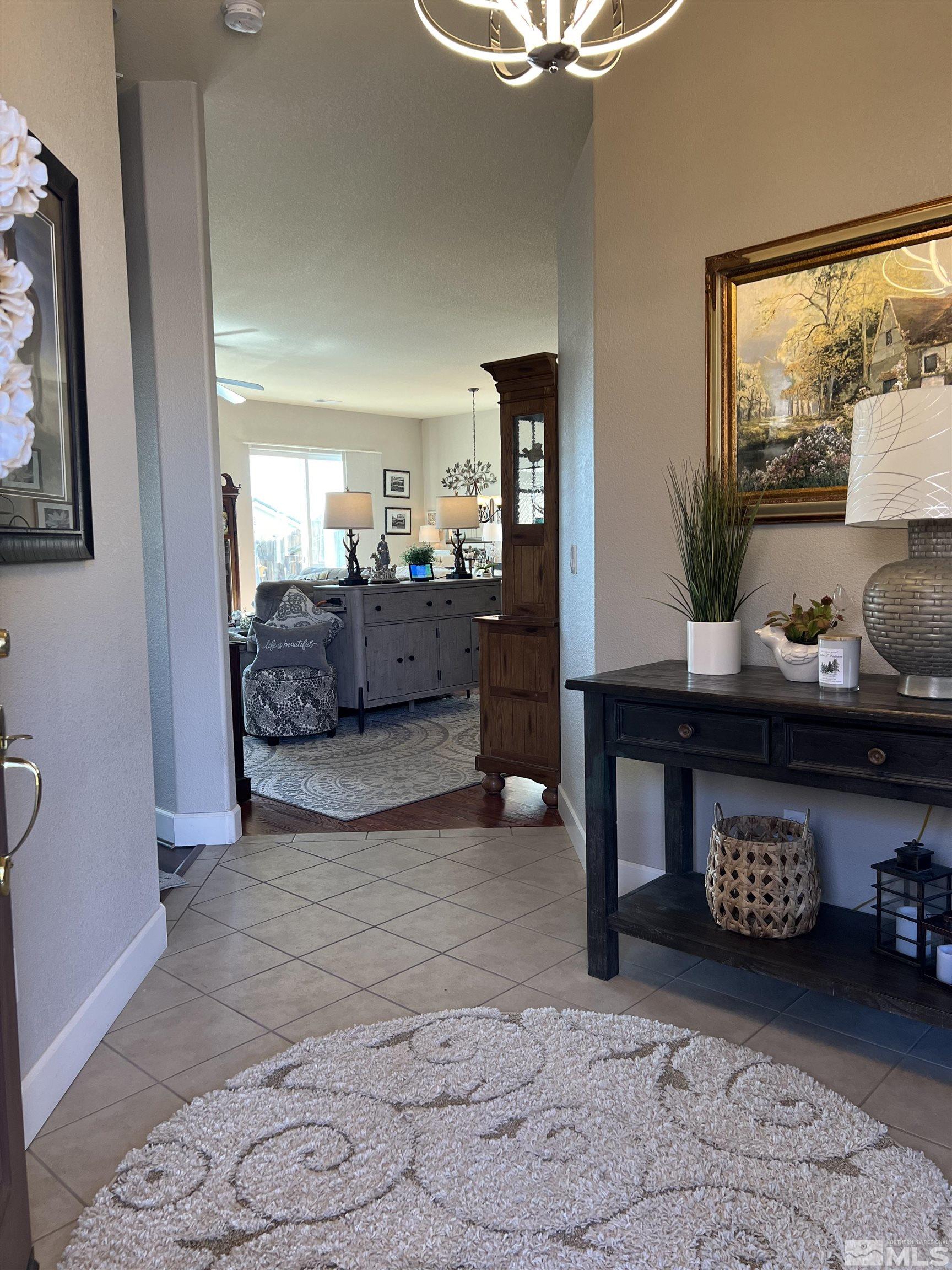 1085 Tee Drive Minden, NV 89423 - Photo 6 of 29 a living room with furniture and a window