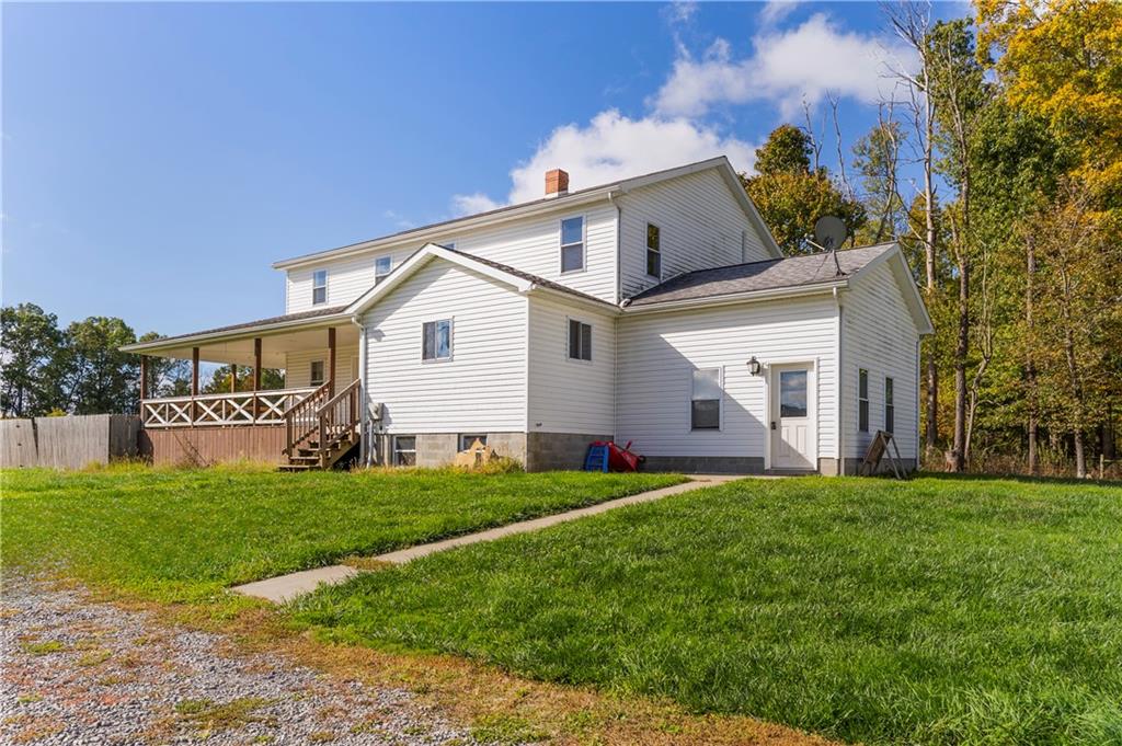 409 Bower Road Fredonia, PA 16124 - Photo 16 of 48 a front view of a house with a yard