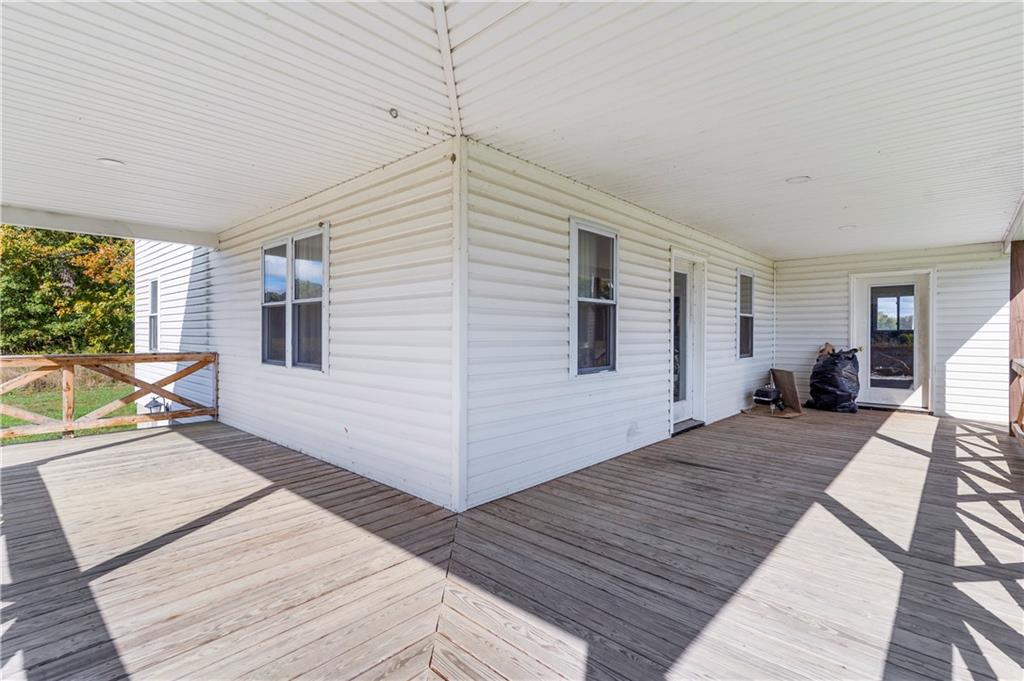 409 Bower Road Fredonia, PA 16124 - Photo 20 of 48 a bed room with a bed and a view of balcony
