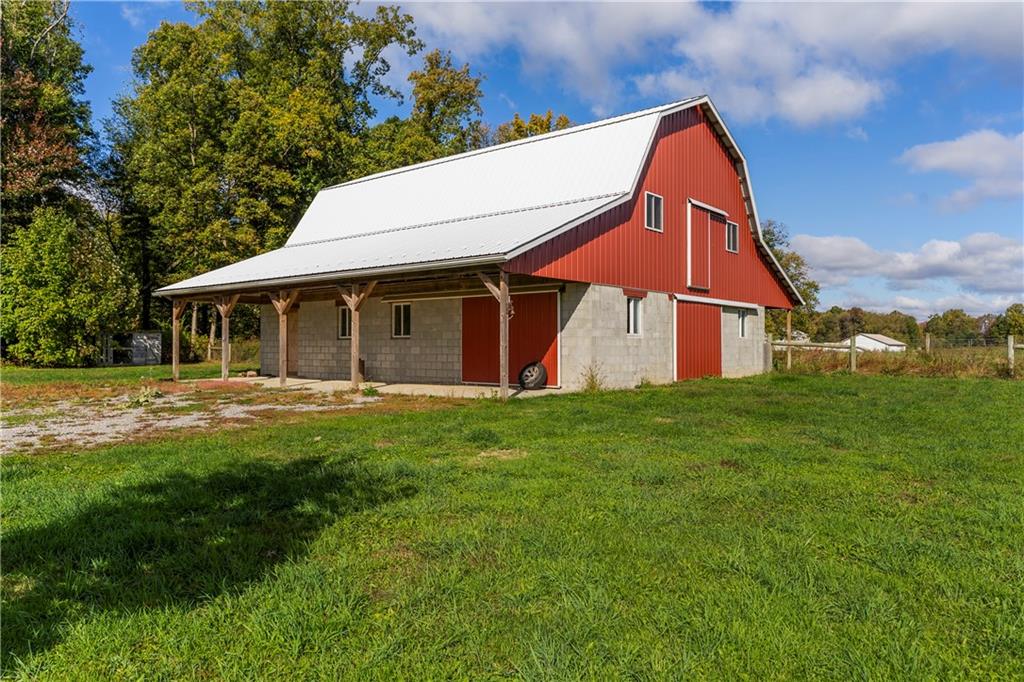 409 Bower Road Fredonia, PA 16124 - Photo 2 of 48 a view of a house with a backyard