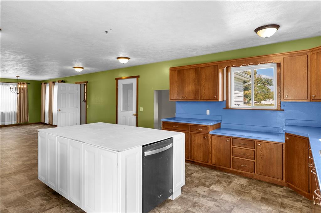 409 Bower Road Fredonia, PA 16124 - Photo 23 of 48 a kitchen that has a sink and a wooden floor