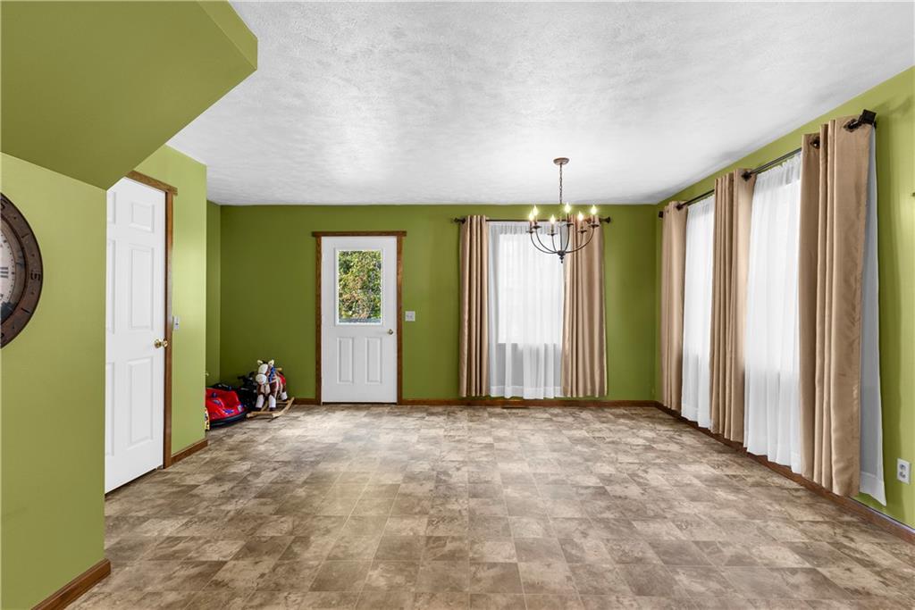 409 Bower Road Fredonia, PA 16124 - Photo 25 of 48 a view of an empty room with a window