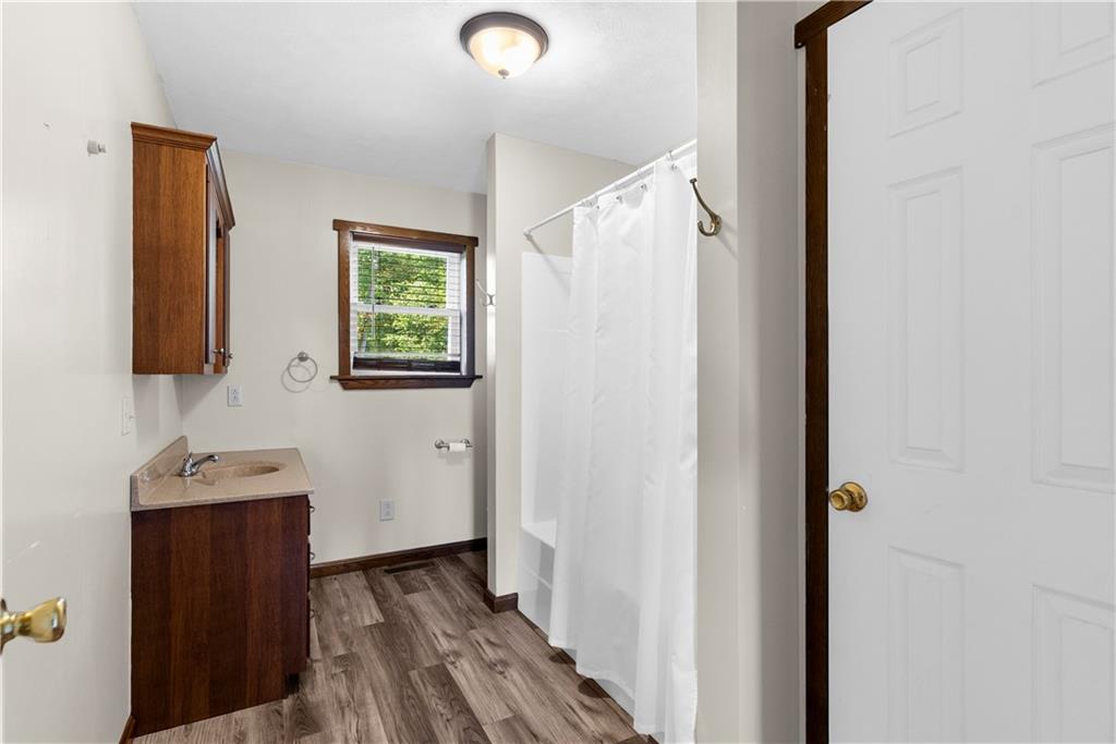 409 Bower Road Fredonia, PA 16124 - Photo 29 of 48 a view of hallway with wooden floor