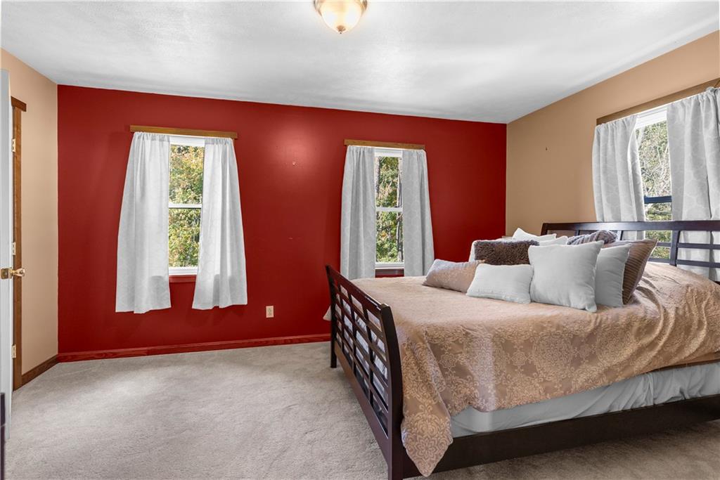 409 Bower Road Fredonia, PA 16124 - Photo 30 of 48 a bedroom with a bed and window