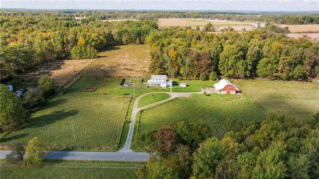 a view of a lake with a yard