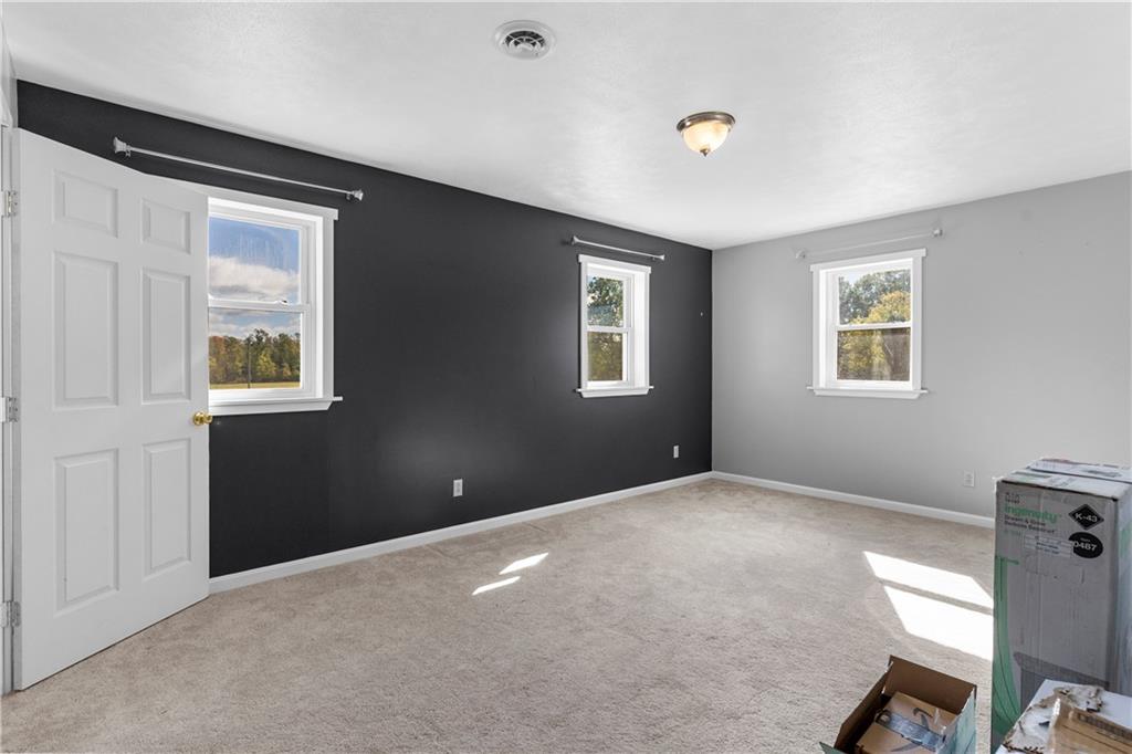 409 Bower Road Fredonia, PA 16124 - Photo 33 of 48 a view of an empty room with a window