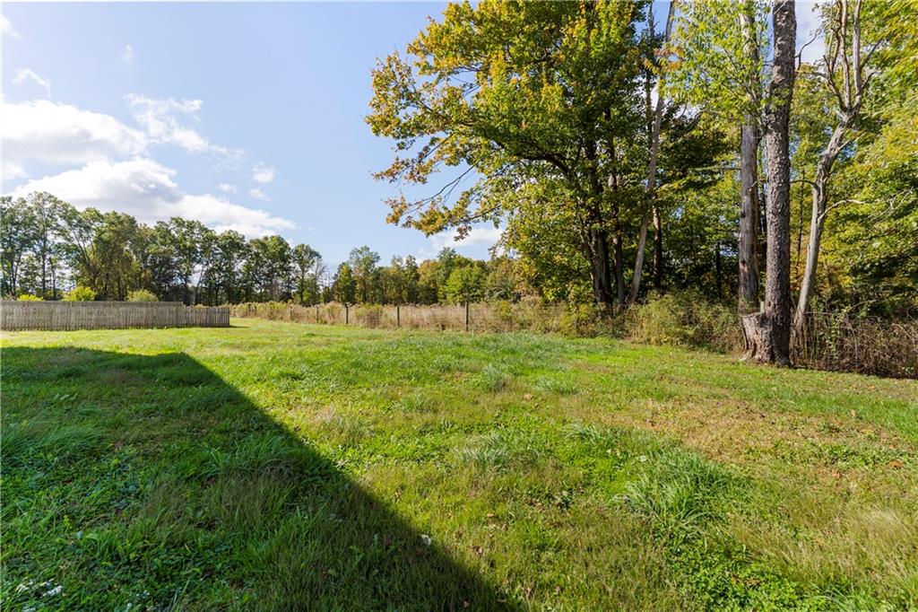 409 Bower Road Fredonia, PA 16124 - Photo 47 of 48 a view of outdoor space with deck and trees