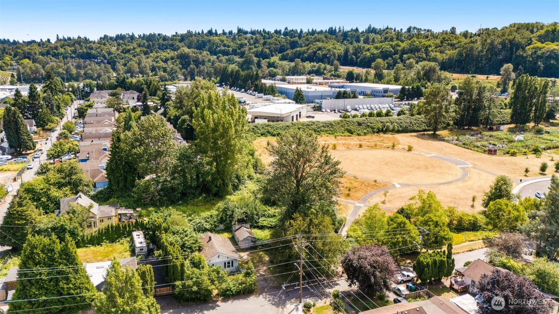 565 South Director Street Seattle, WA 98108 - Photo 20 of 34 a view of a houses with a yard