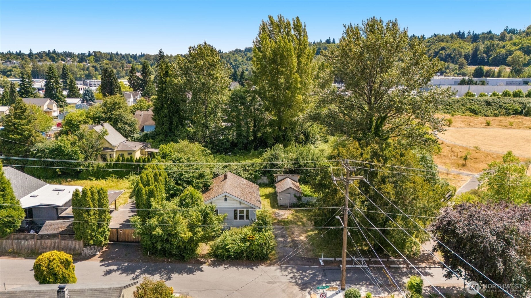 565 South Director Street Seattle, WA 98108 - Photo 2 of 34 a view of a garden with lawn chairs