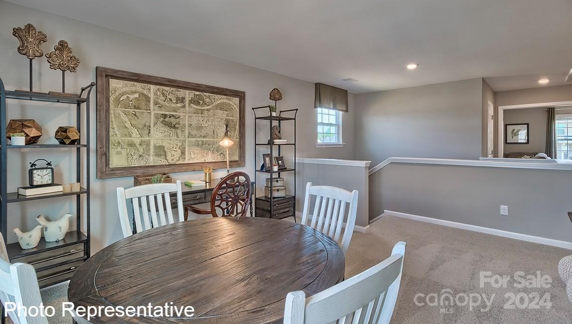 113 Dandelion Road Fletcher, NC 28732 - Photo 19 of 29 a view of a dining room with furniture window and wooden floor