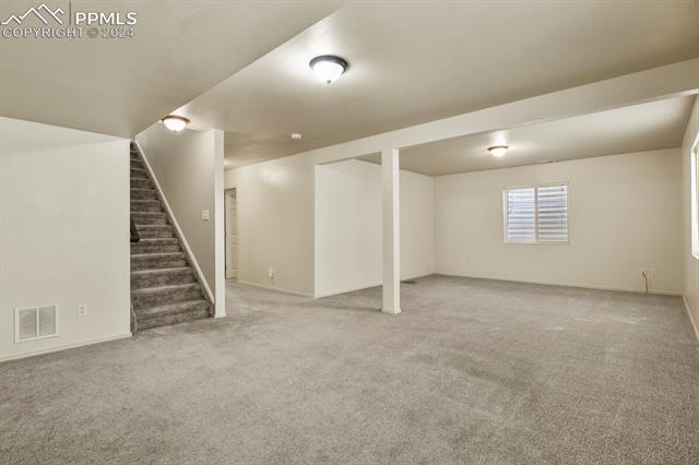 8036 Ferguson Road Peyton, CO 80831 - Photo 20 of 29 Basement with light carpet