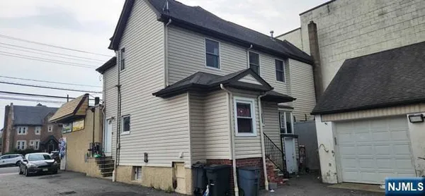 a view of a house with a garage