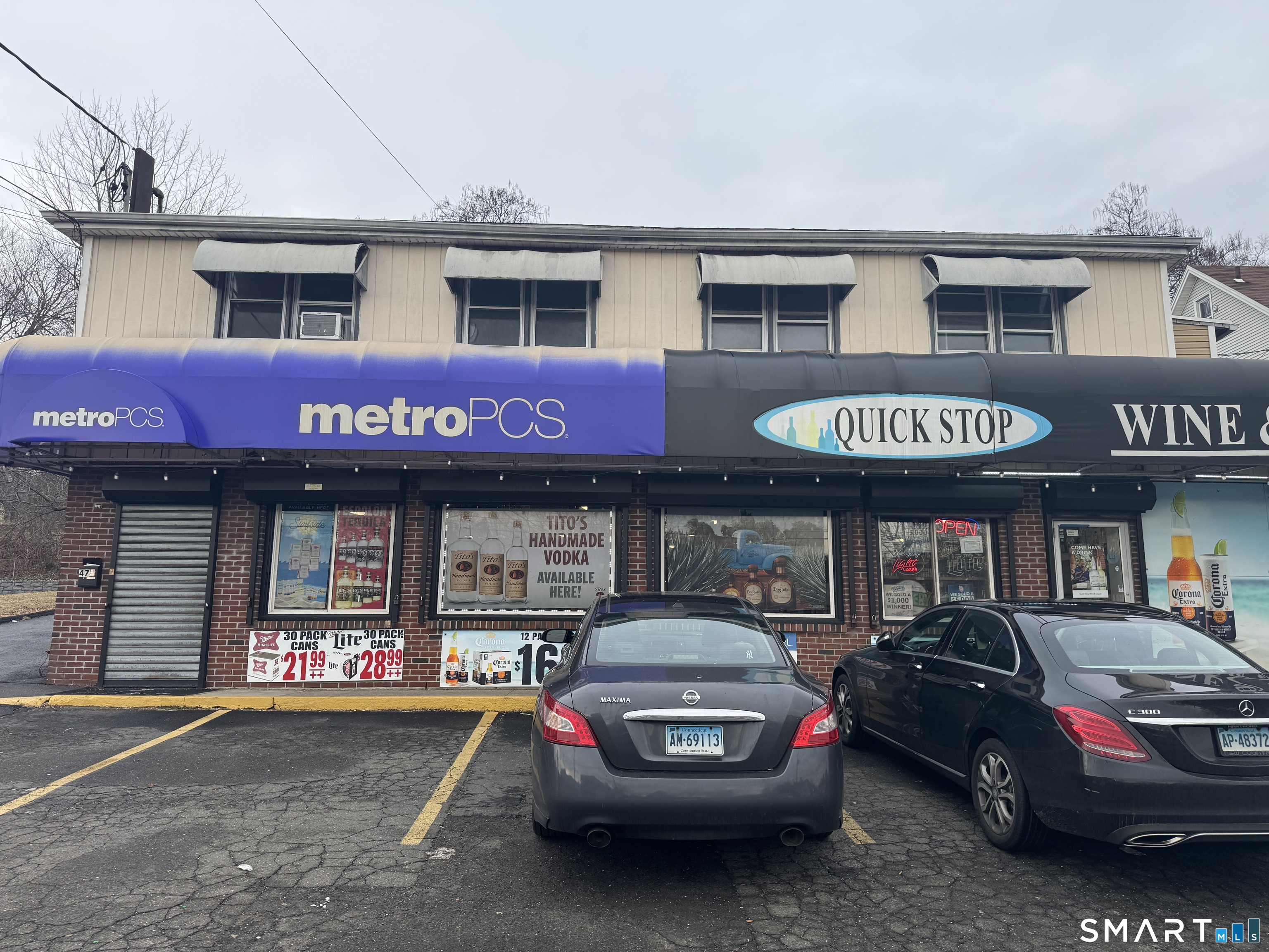 a car parked in front of a store