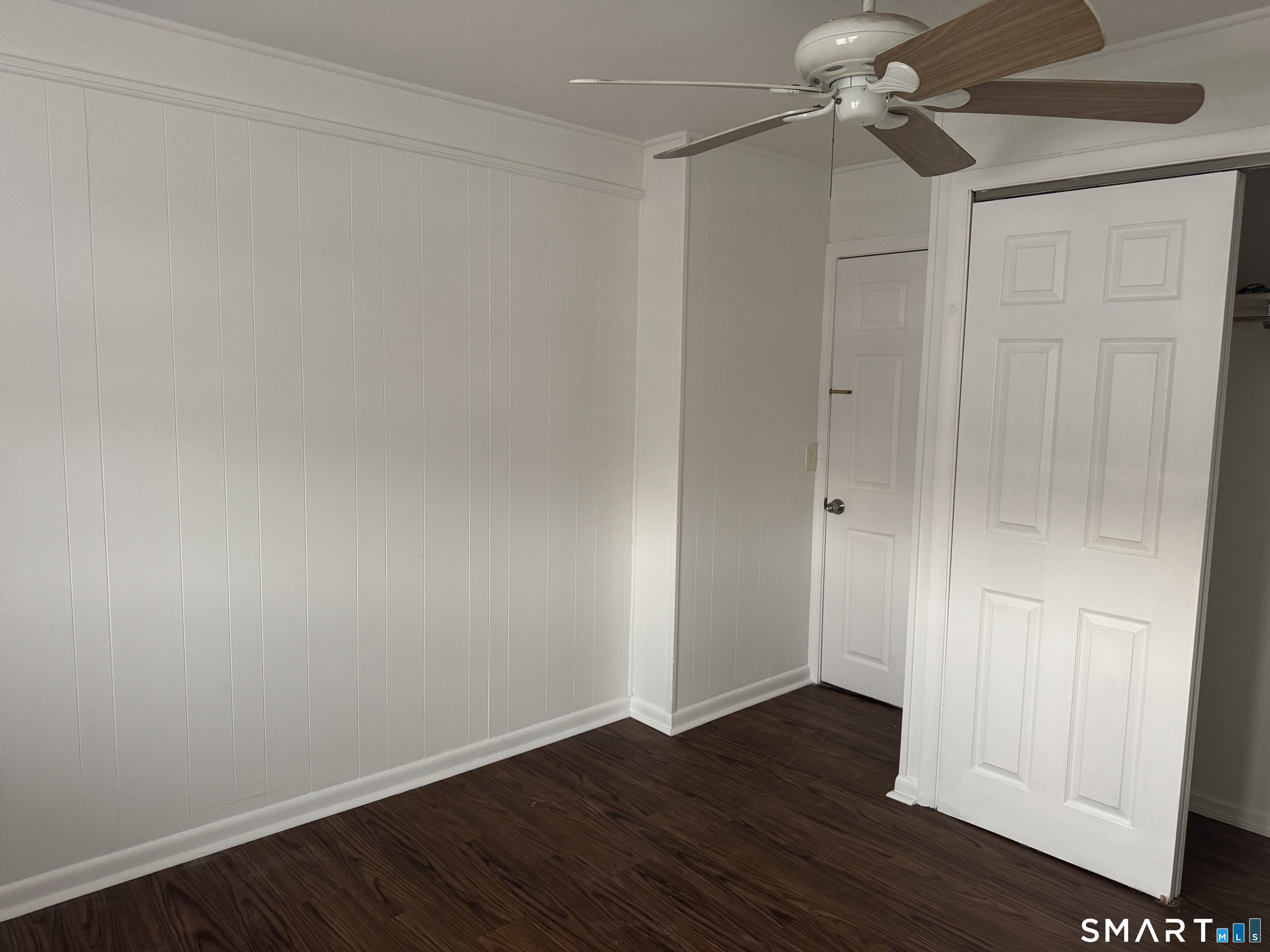 47 Pershing Drive, Unit 1 Ansonia, CT 06401 - Photo 16 of 21 wooden floor in an empty room