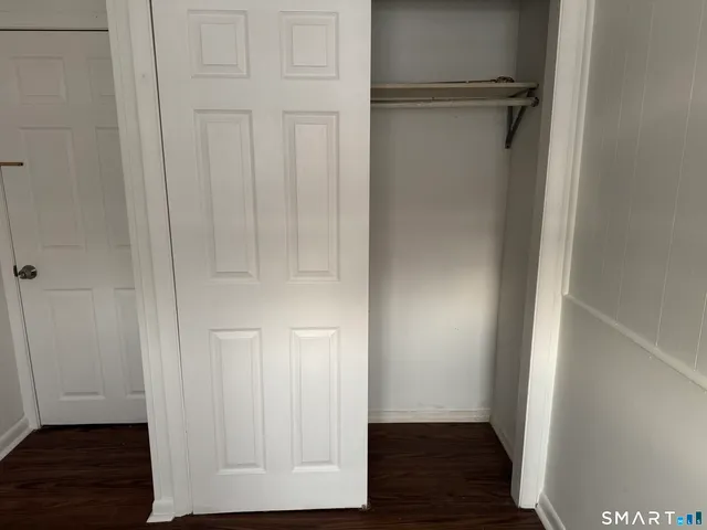 a view of hallway with closet