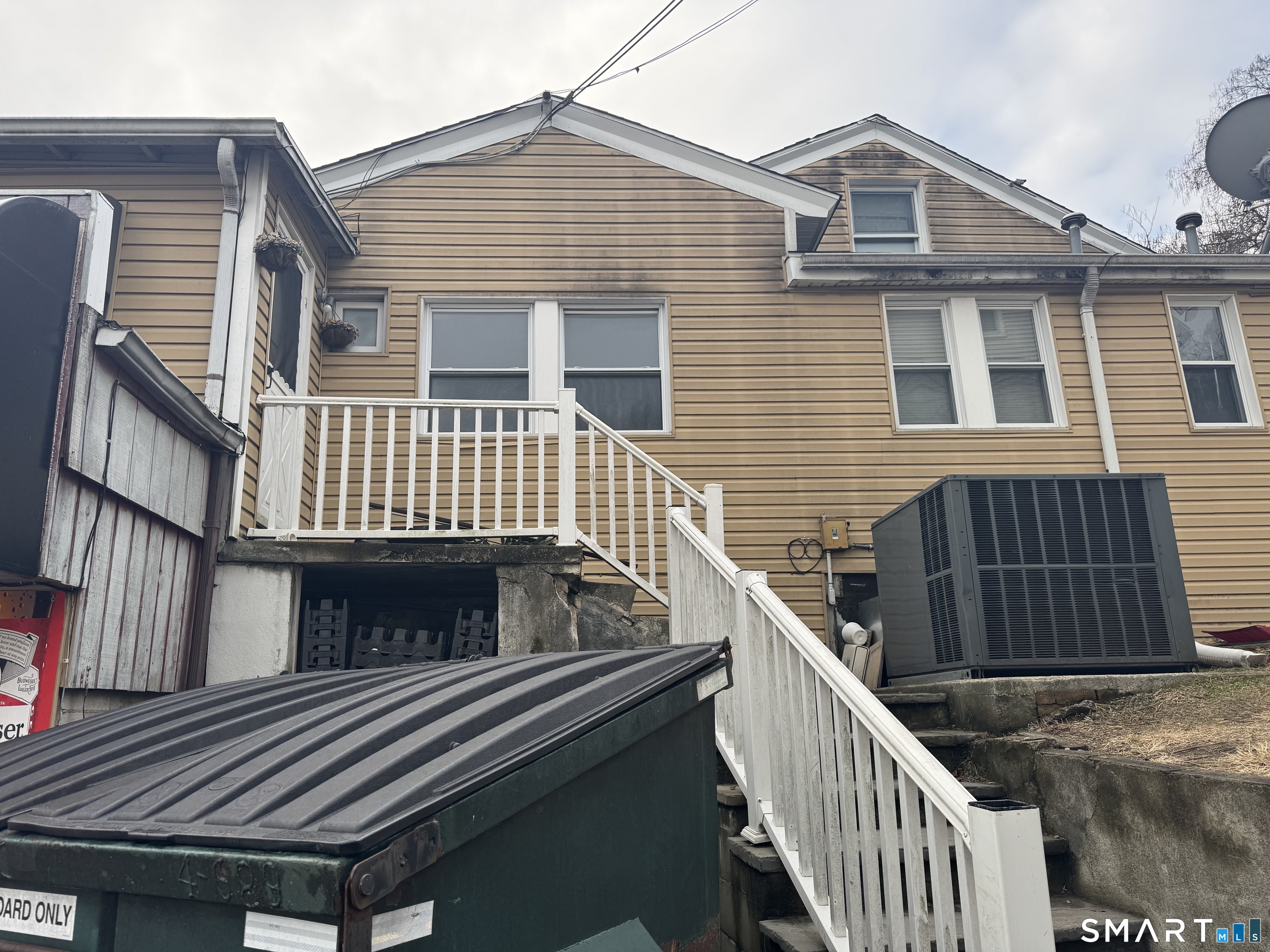 47 Pershing Drive, Unit 1 Ansonia, CT 06401 - Photo 2 of 21 a view of street along with deck