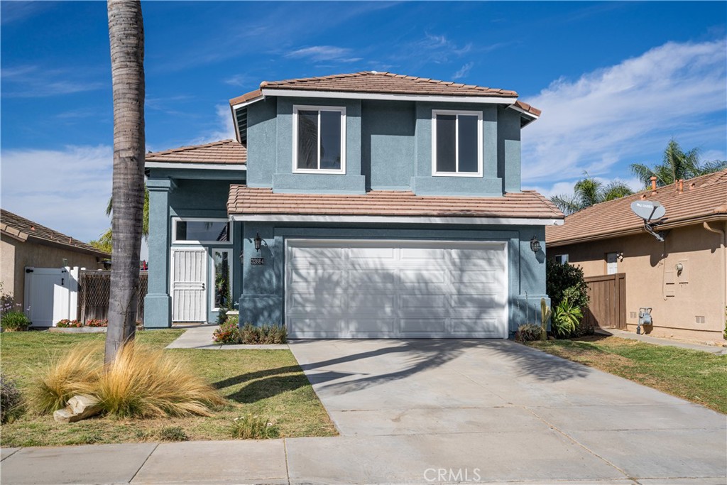 32884 Tulley Ranch Road Temecula, CA 92592 - Photo 1 of 1 a front view of a house with a yard