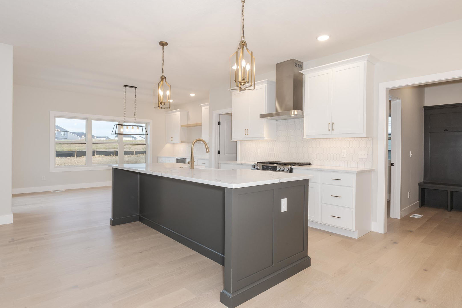 1009 Mount Carmel Road Bloomington, IL 61705 - Photo 15 of 39 a kitchen with a sink and cabinets