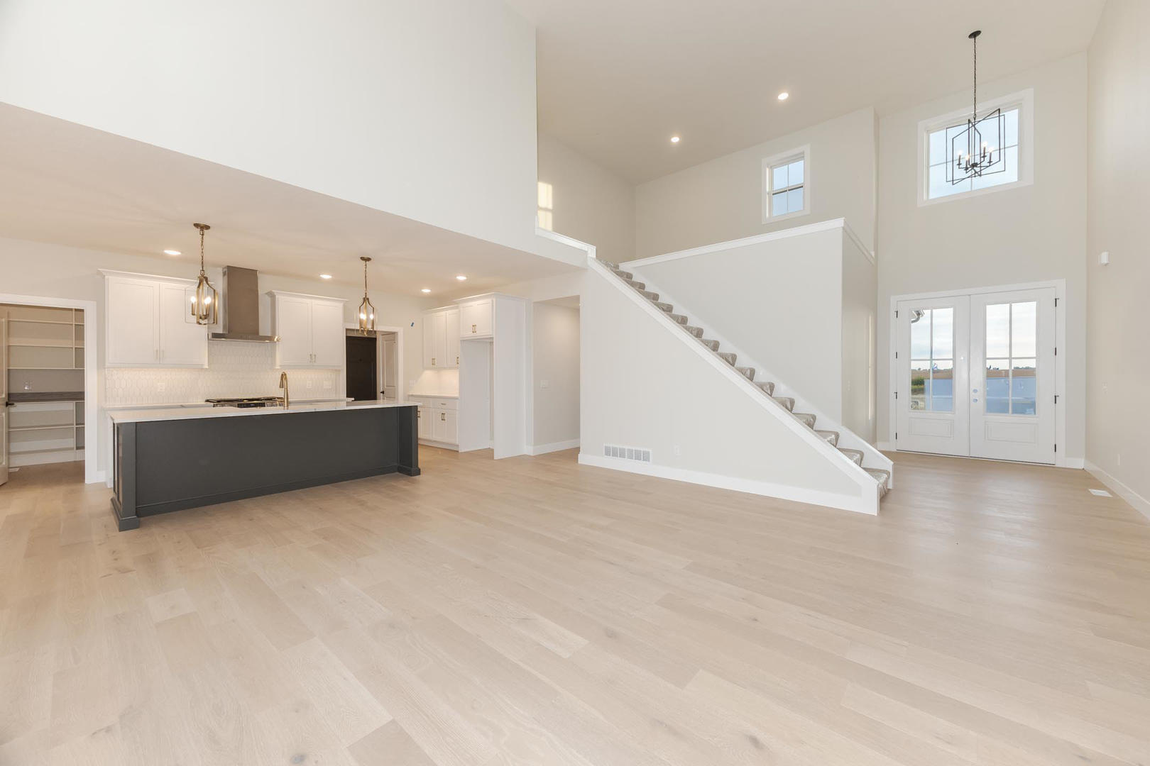 1009 Mount Carmel Road Bloomington, IL 61705 - Photo 17 of 39 a view of a kitchen with a sink and a large window