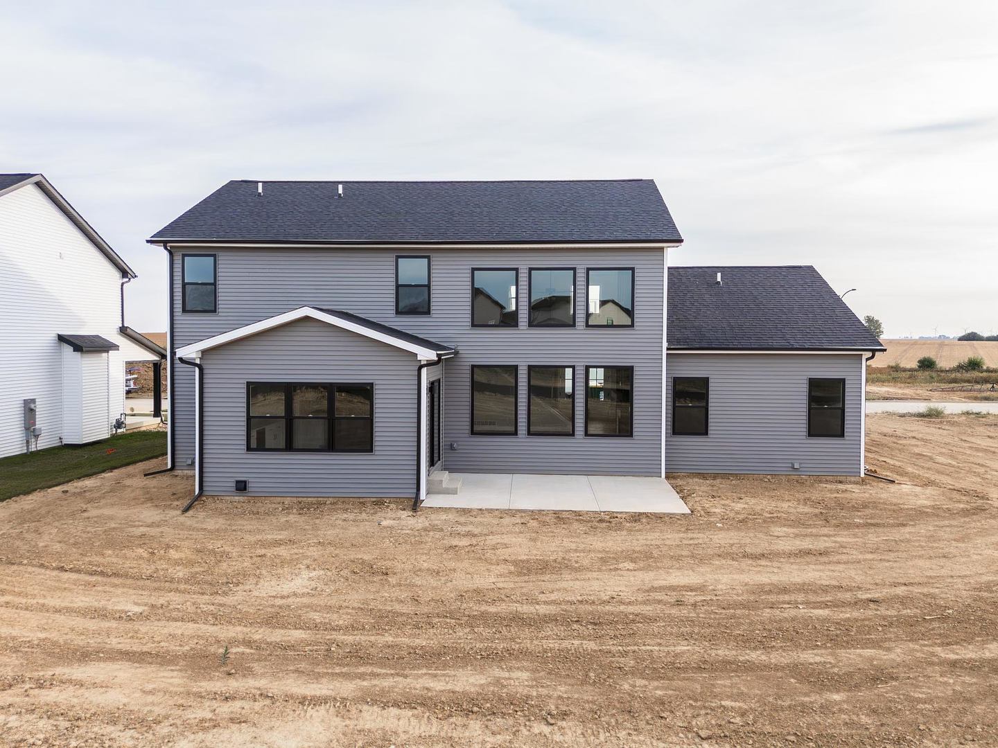 1009 Mount Carmel Road Bloomington, IL 61705 - Photo 37 of 39 a front view of a house with a yard
