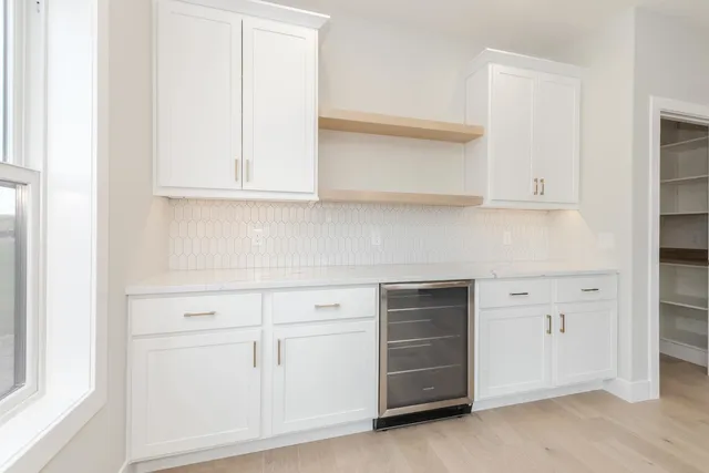 an empty room with cabinets