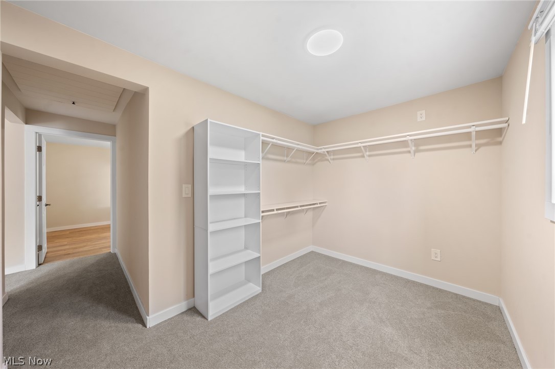 1617 Graham Road Stow, OH 44224 - Photo 32 of 49 Walk in closet with light colored carpet