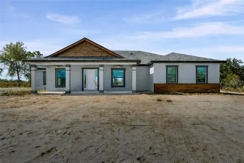 front view of a house with yard