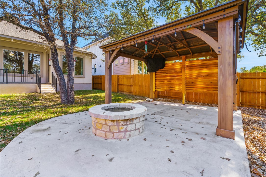 941 Del Raphael Drive Leander, TX 78641 - Photo 27 of 33 The custom wooden pergola is just begging for an outdoor dining table, string lights, and weekend game-day viewings