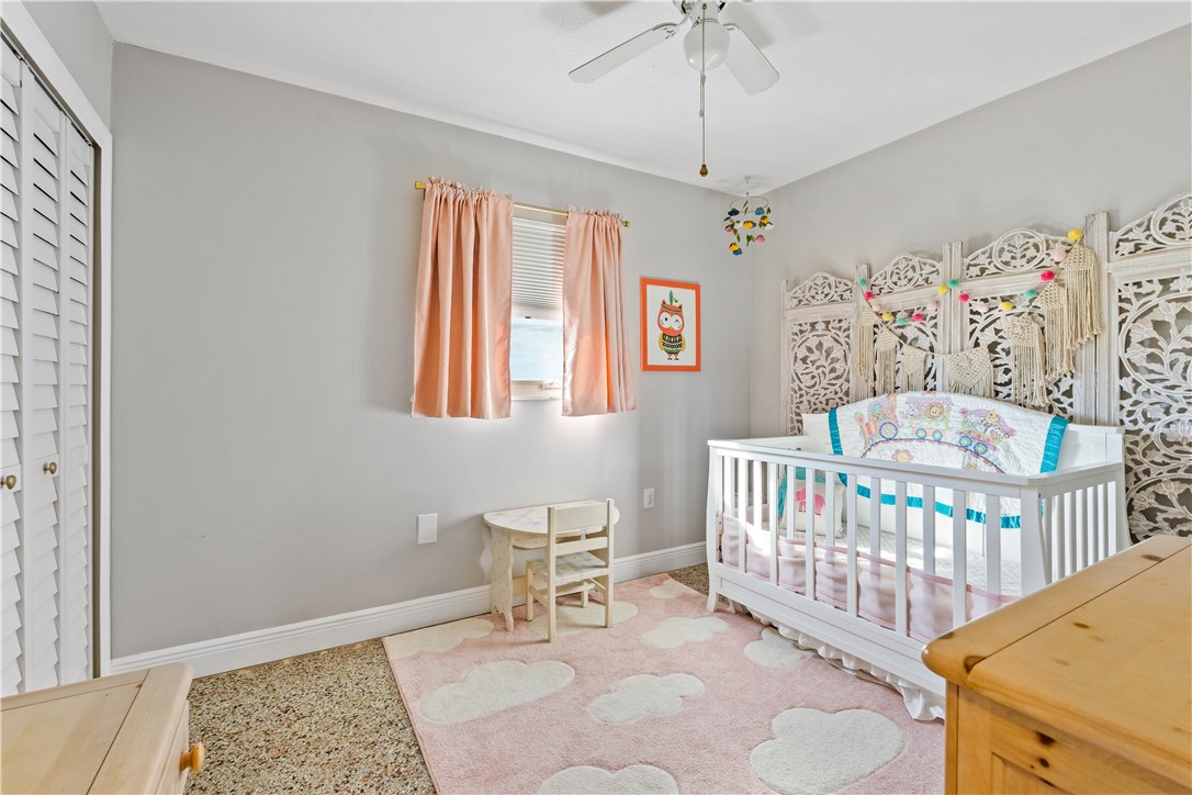 1621 5th Avenue Vero Beach, FL 32960 - Photo 16 of 35 a bedroom with furniture and a window