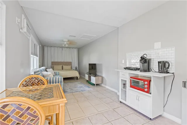 a living room with furniture and a couch