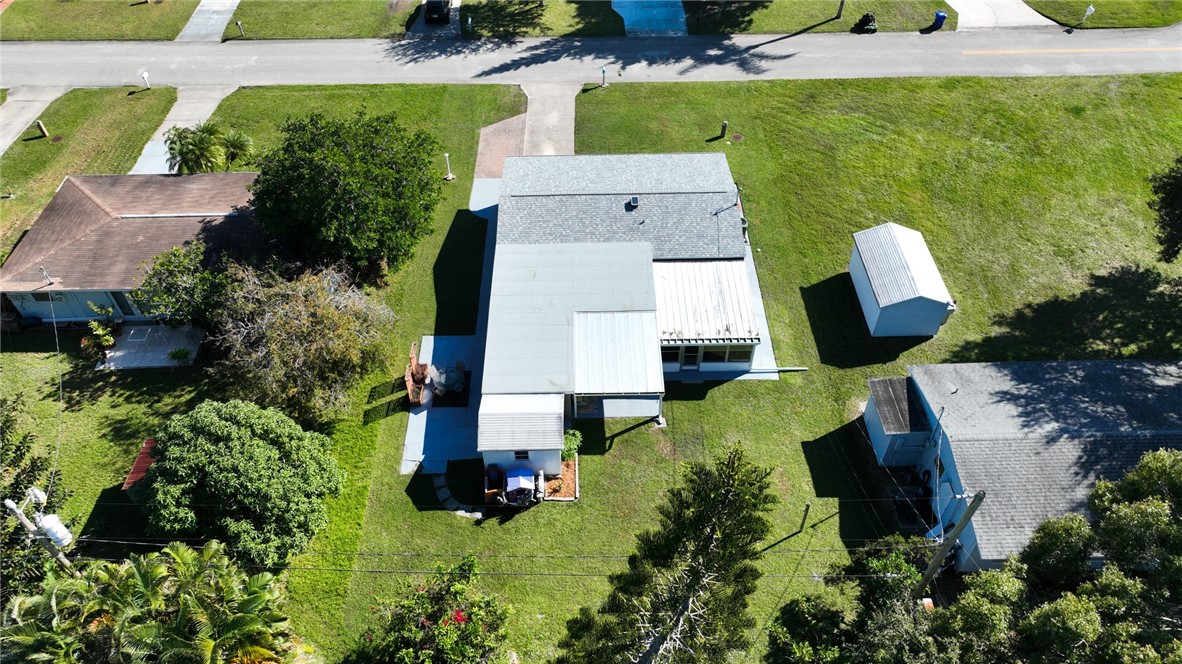 1621 5th Avenue Vero Beach, FL 32960 - Photo 33 of 35 an aerial view of house with yard swimming pool and outdoor seating