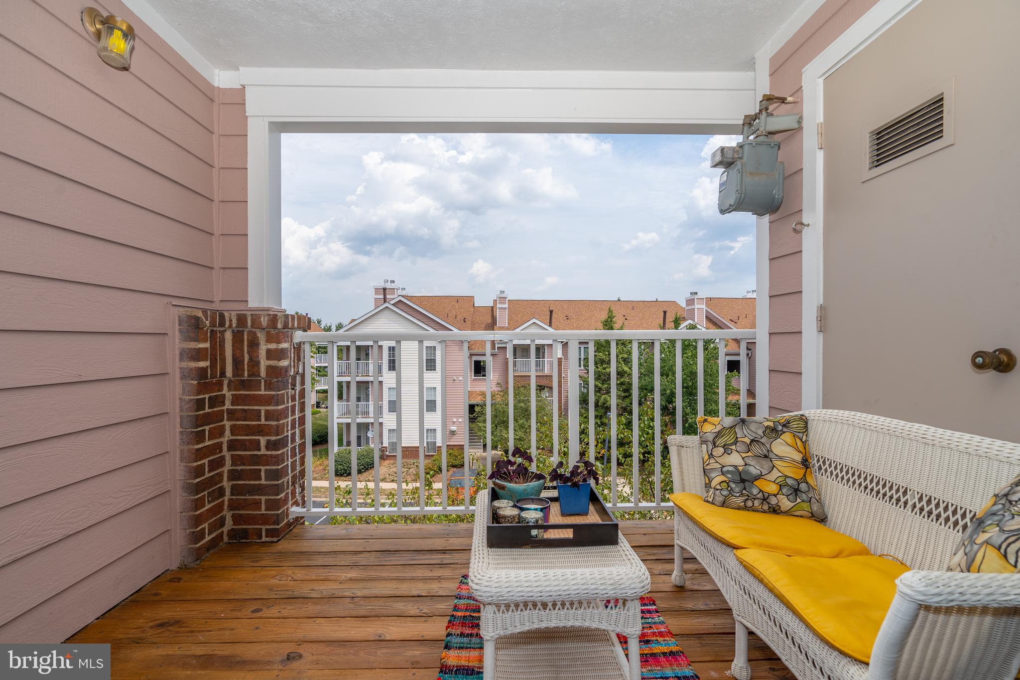 20963 Timber Ridge Terrace, Unit 301 Ashburn, VA 20147 - Photo 1 of 24 Covered Patio- great for Multi Seasonal use