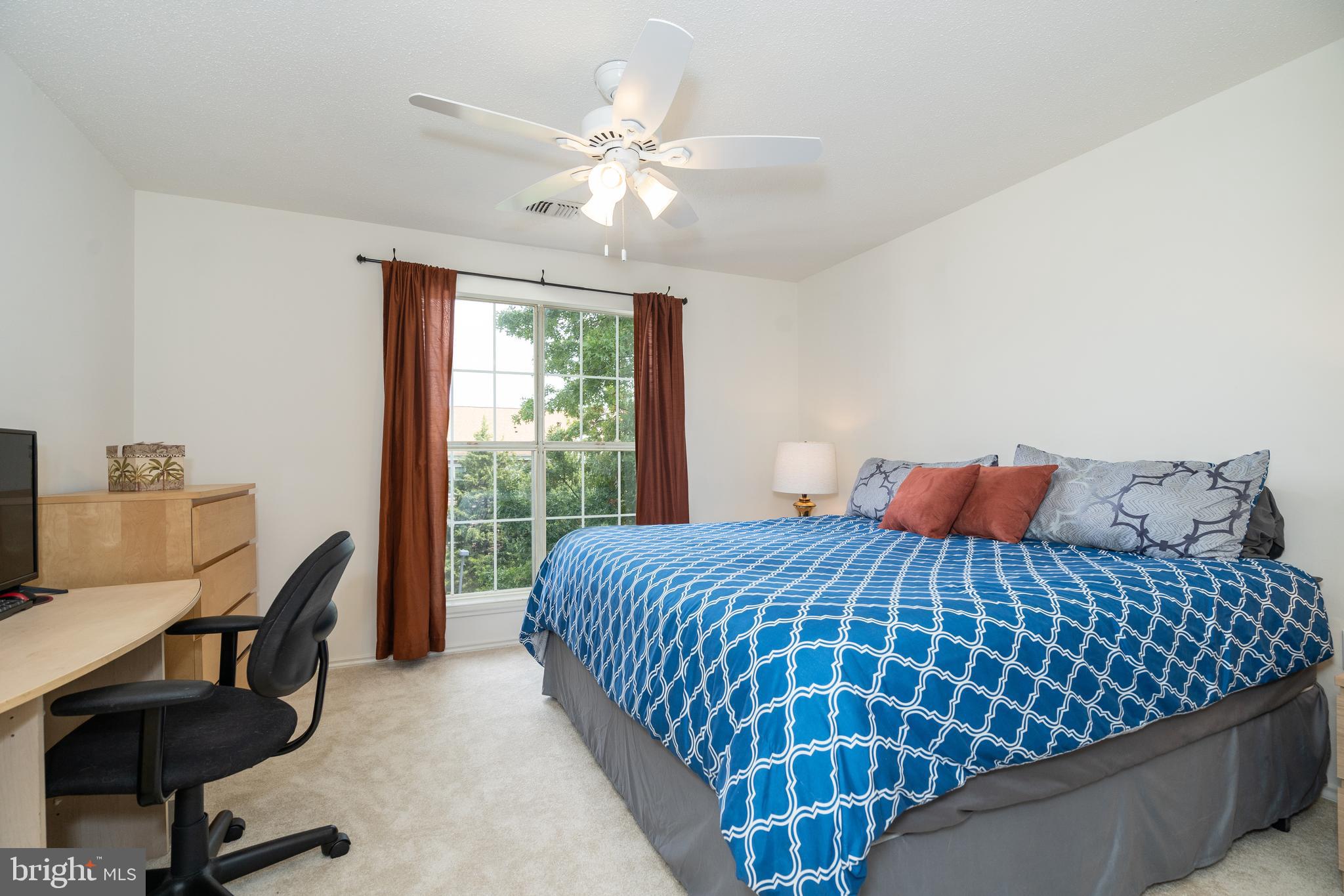 20963 Timber Ridge Terrace, Unit 301 Ashburn, VA 20147 - Photo 12 of 24 Master Bedroom with Ceiling fan