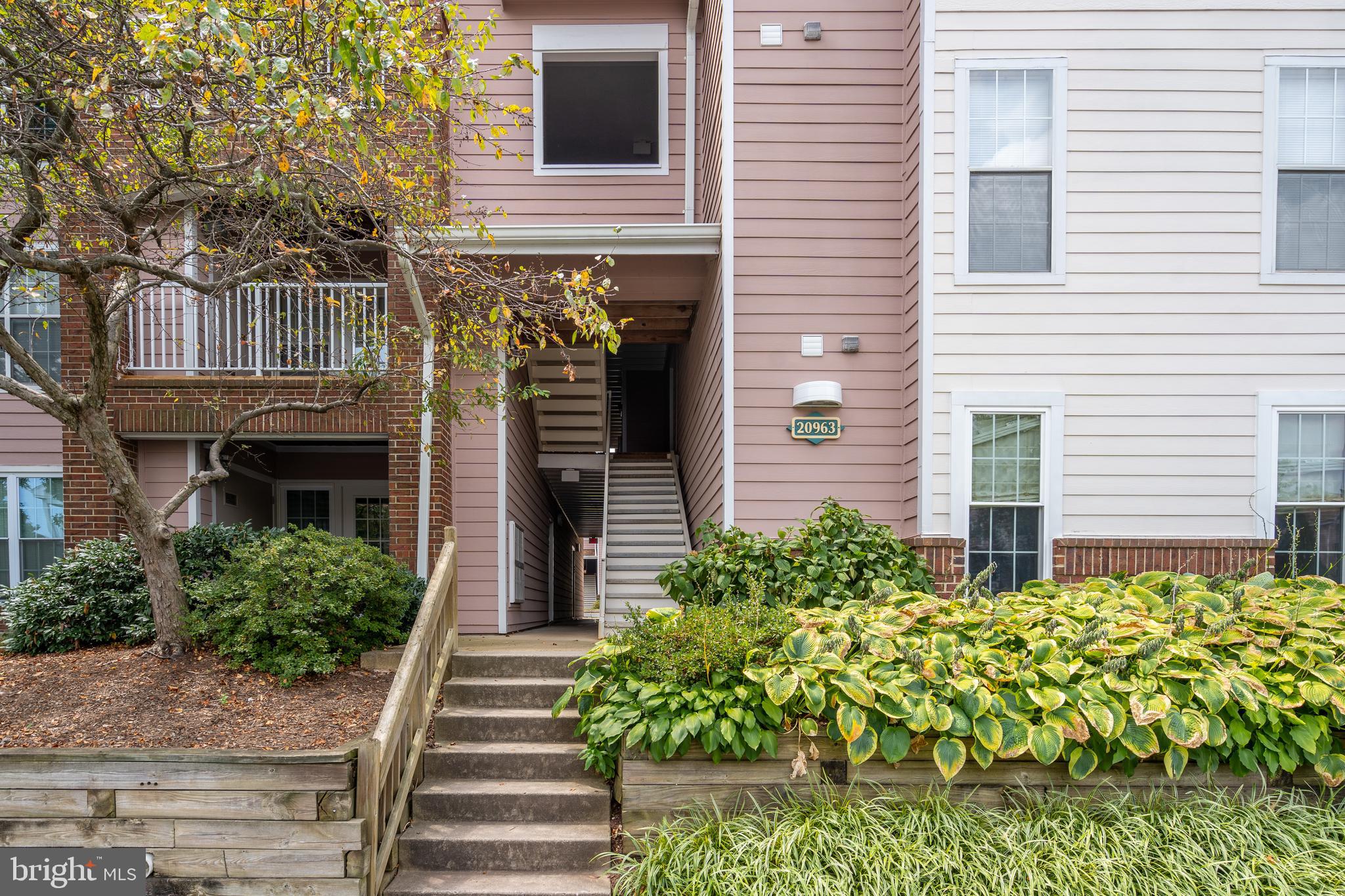 20963 Timber Ridge Terrace, Unit 301 Ashburn, VA 20147 - Photo 2 of 24 Lots of Open Parking near this unit