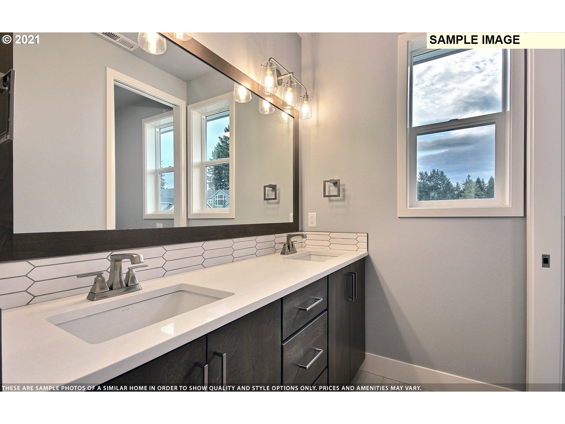 3338 Northwest Tanner Street Camas, WA 98607 - Photo 20 of 25 a bathroom with a sink double vanity and a mirror