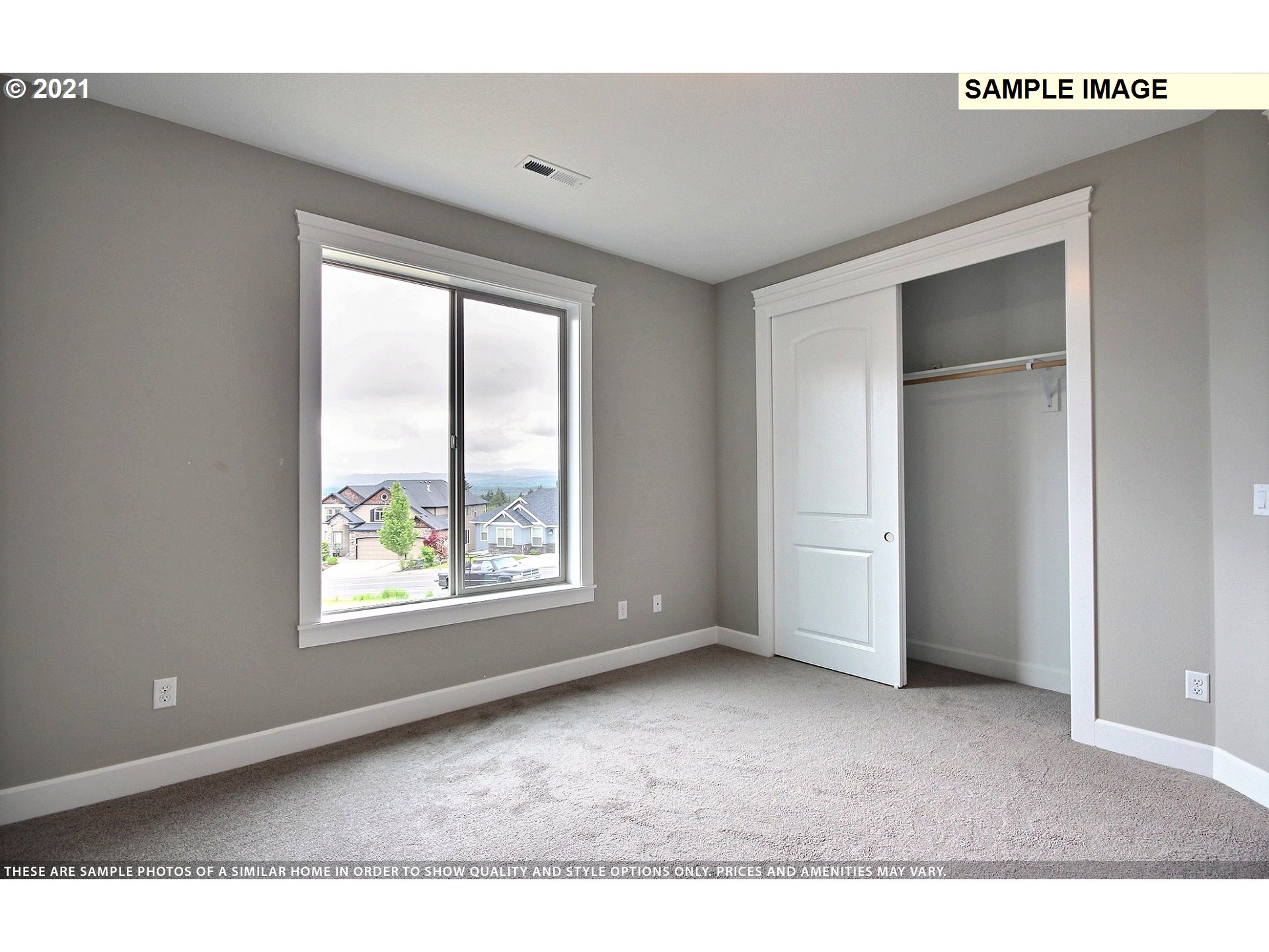 3338 Northwest Tanner Street Camas, WA 98607 - Photo 22 of 25 a big room with windows and closet
